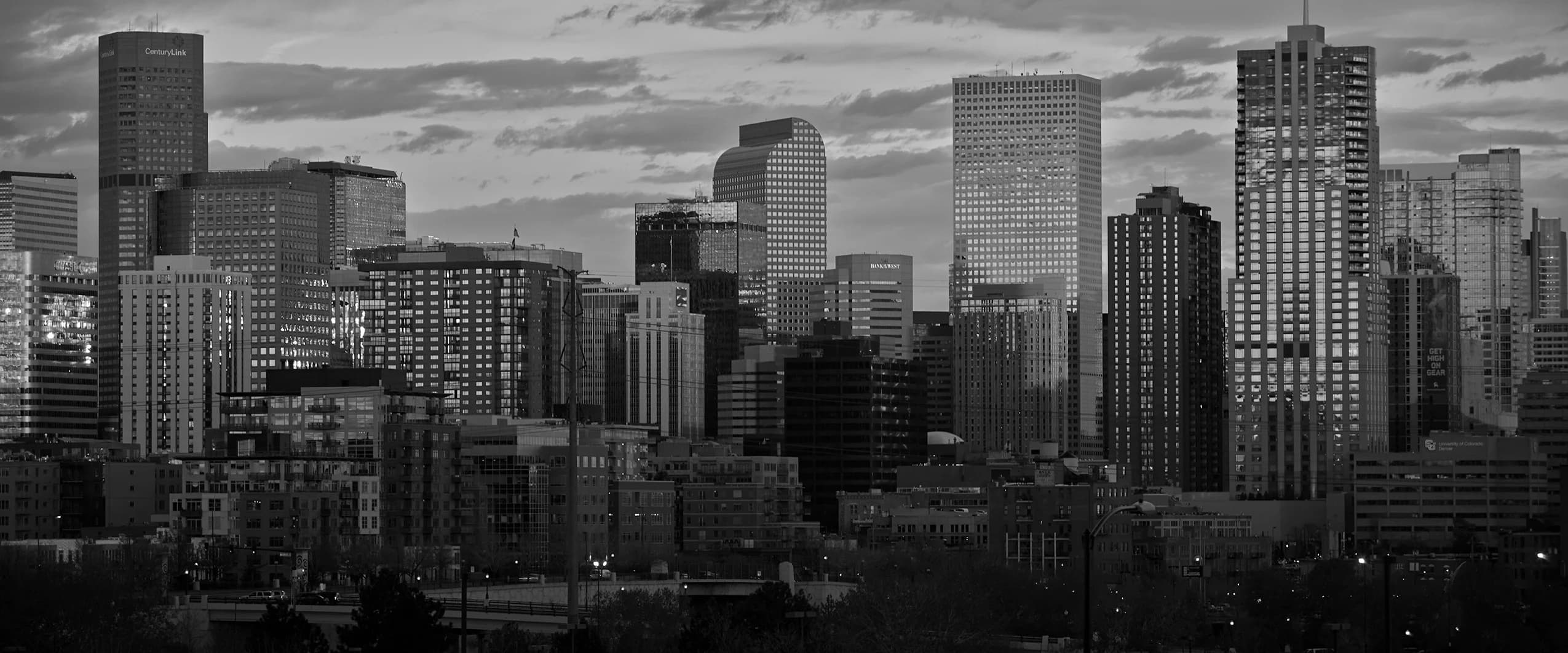 Denver skyline with mountains behind it
